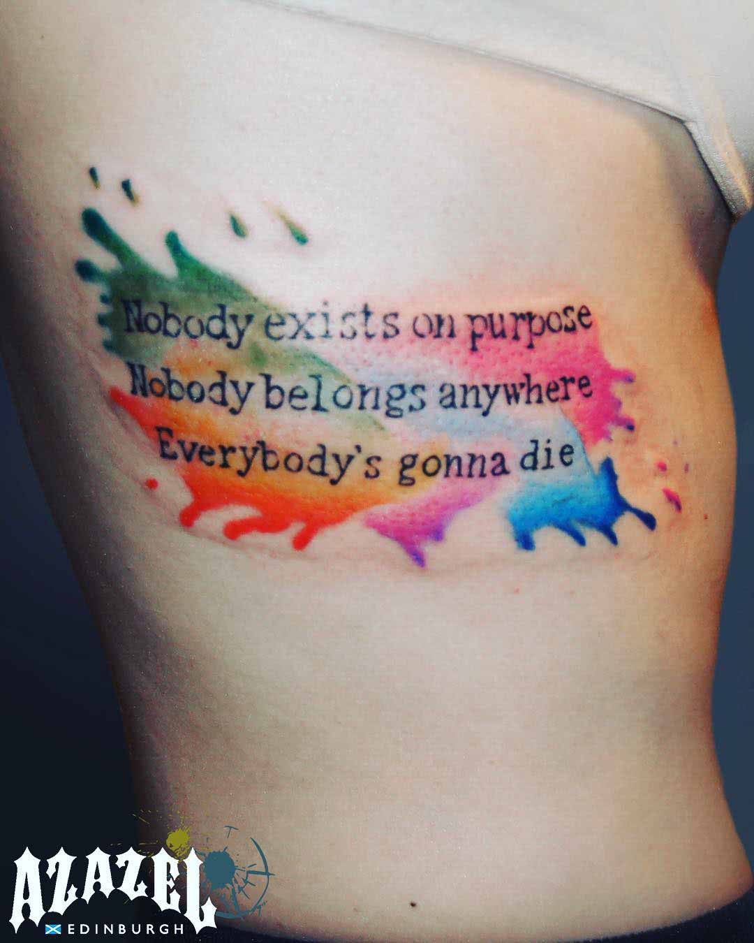 lettering tattoo on ribs