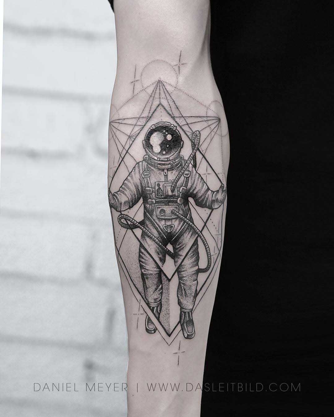 arm tattoo astronaut