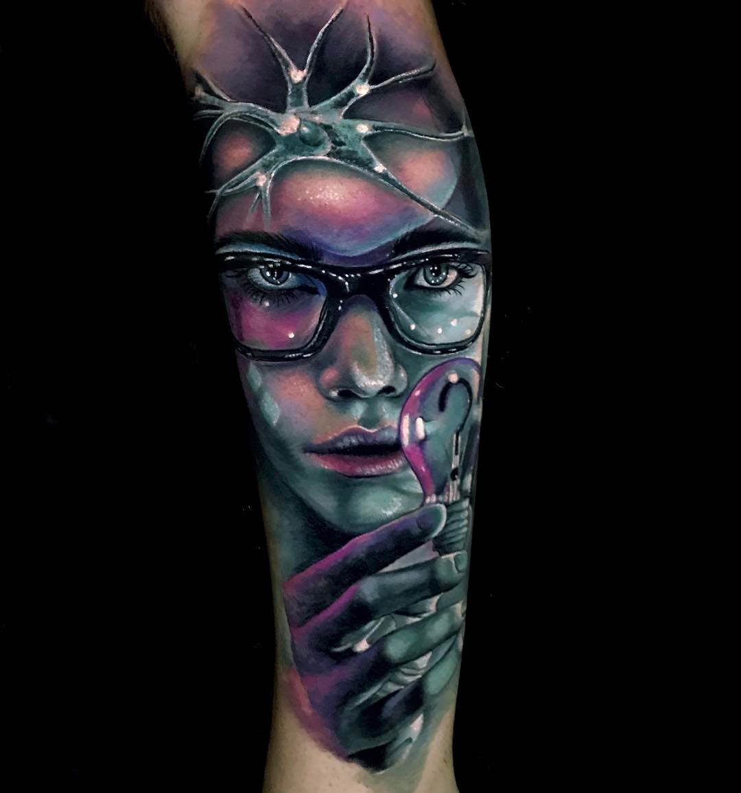 scientific realistic abstarct tattoo on arm