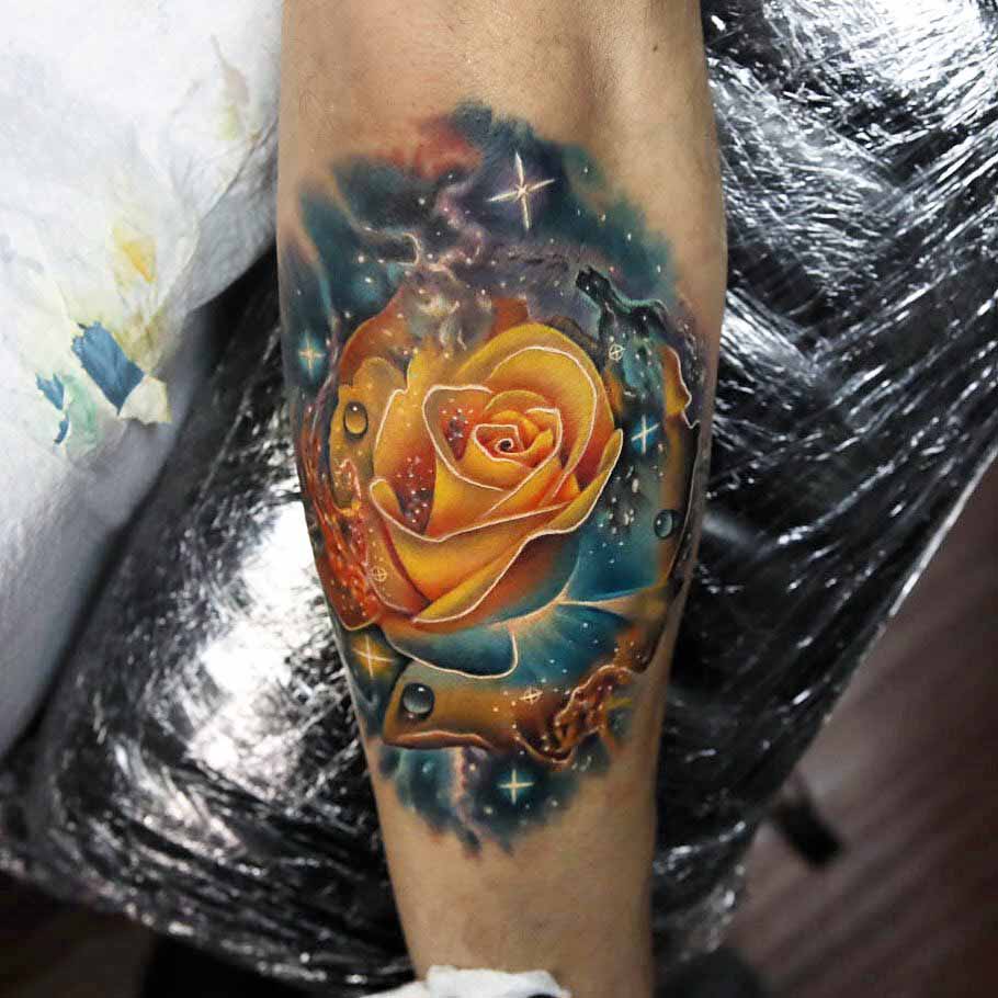 space yellow rose tattoo on arm