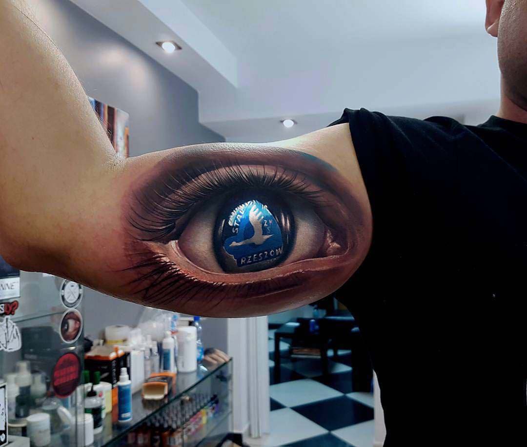 Stal Rzeszów football club tattoo eye on bicep