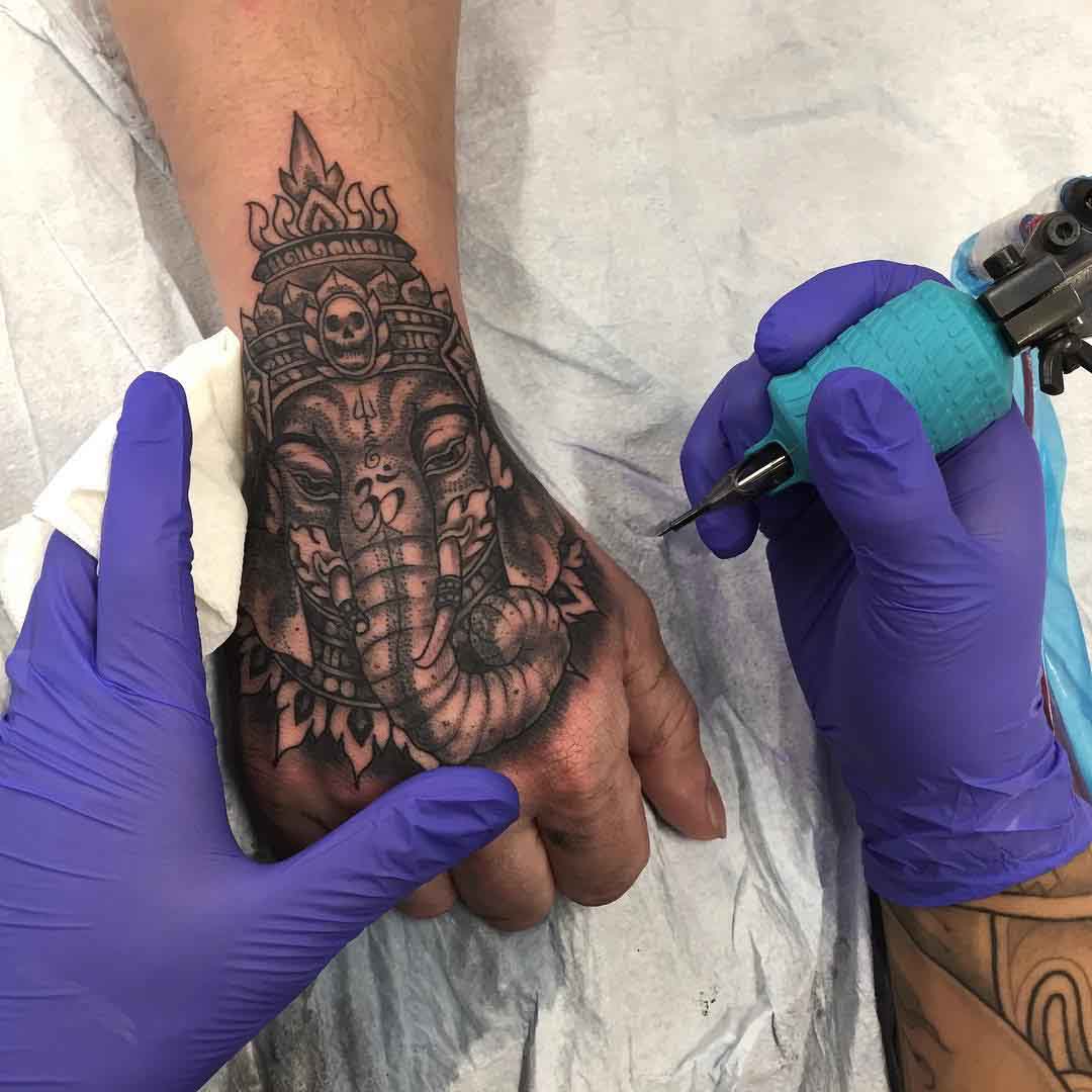 ganesha tattoo on hand