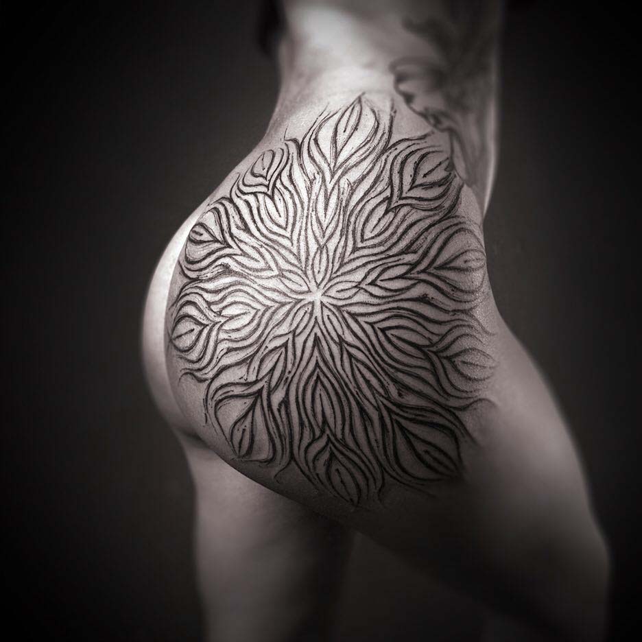 ornamental tattoo on hip