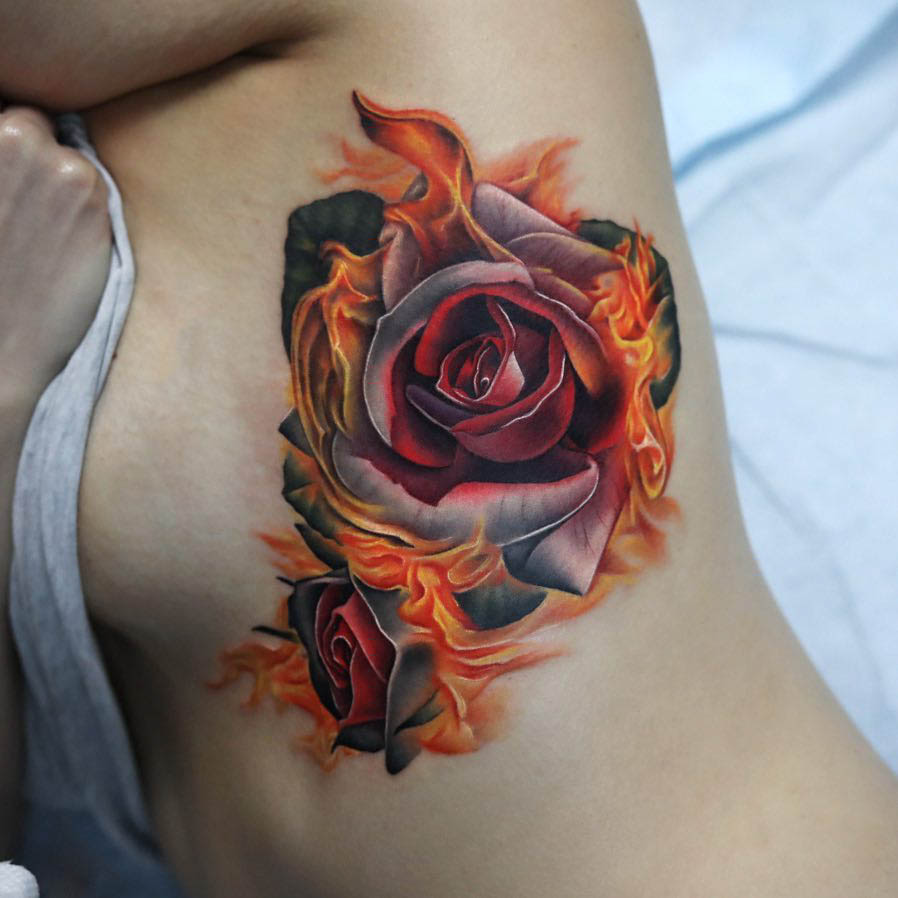 rose tattoo on ribs