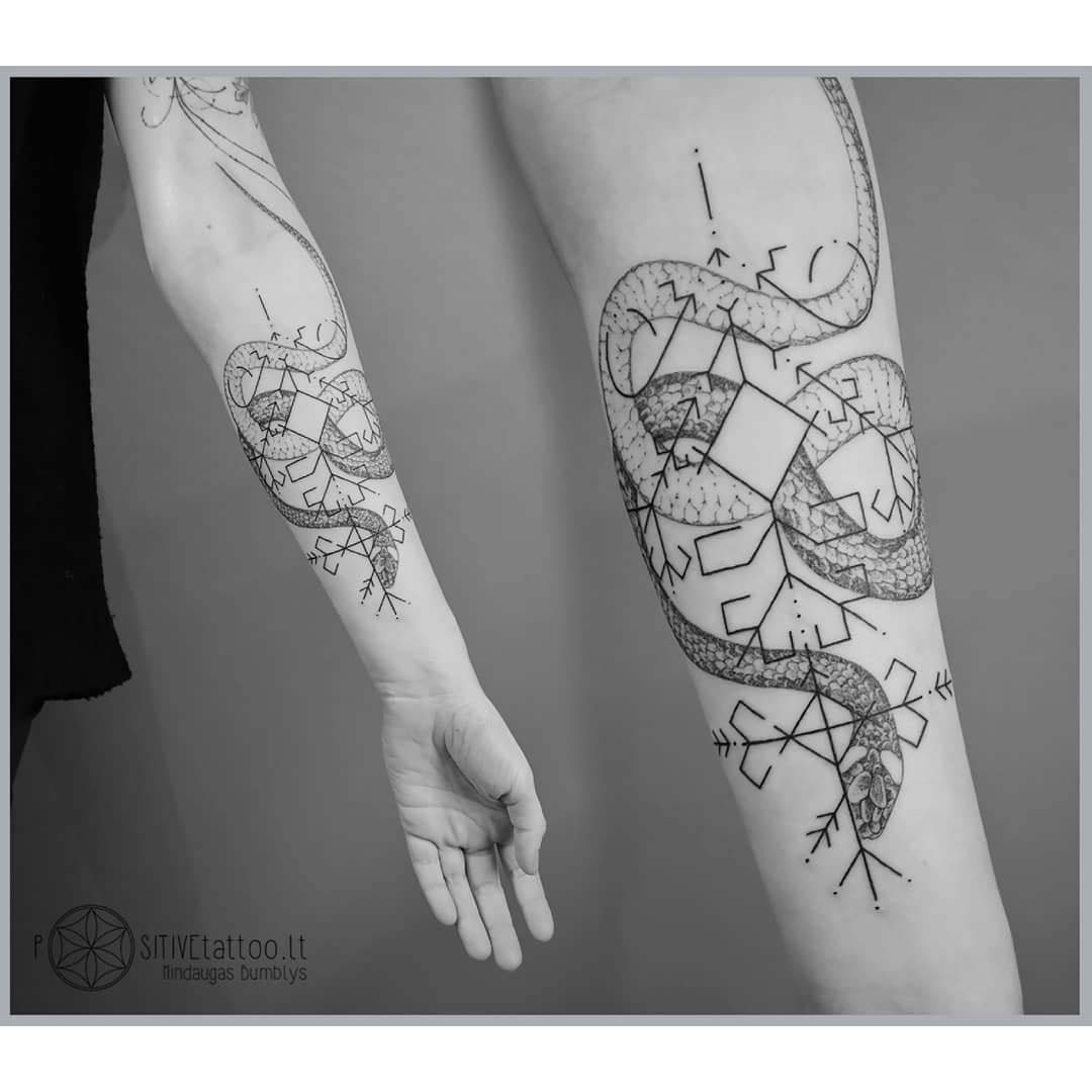 snake tattii with ethnic pattern