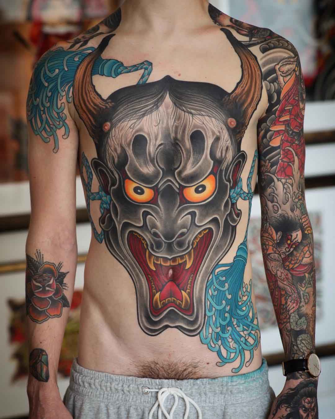 hannya mask tattoo on body