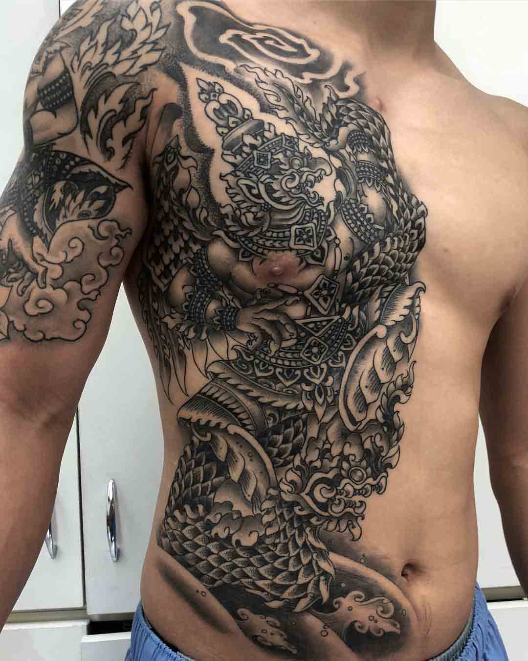 japanese side tattoo mythological battle