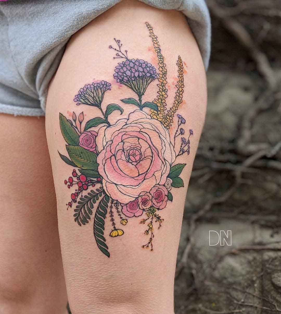 thigh tattoo flowers