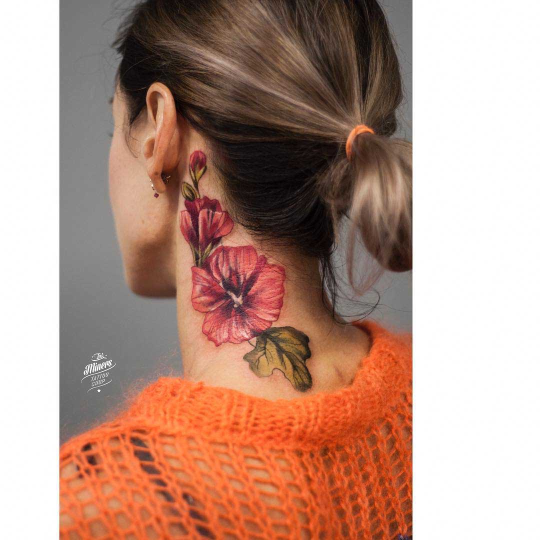 flower tattoo on neck