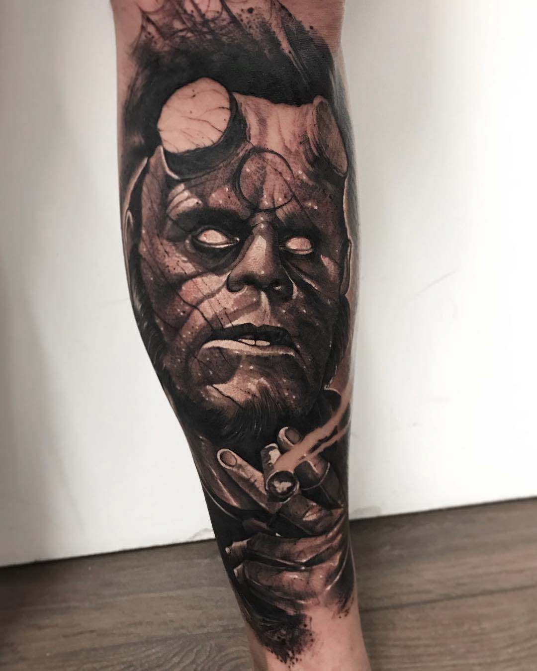 calf tattoo hellboy