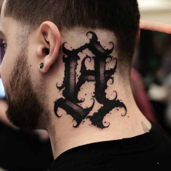 nape tattoo letter