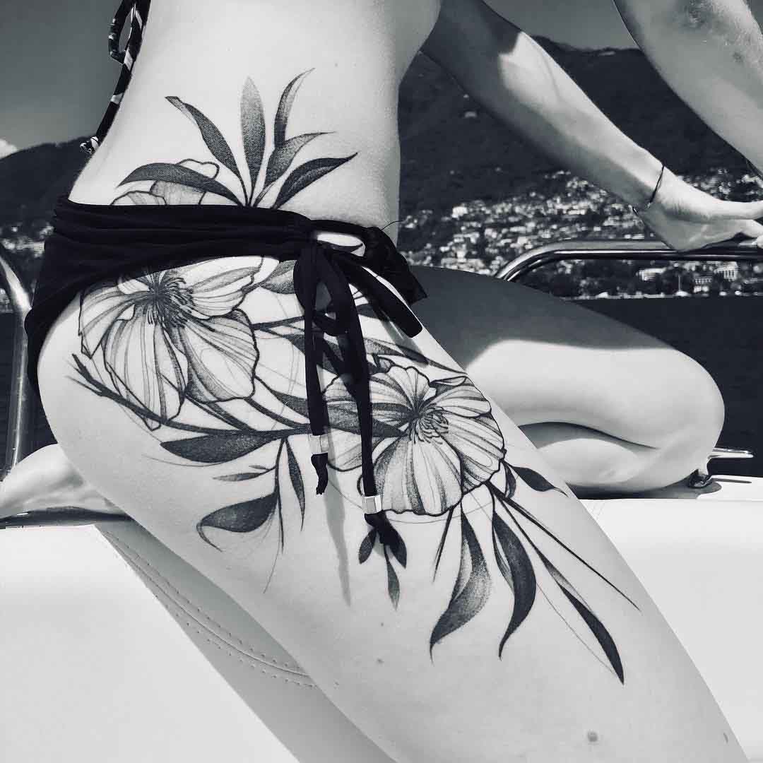 hip tattoo flowers