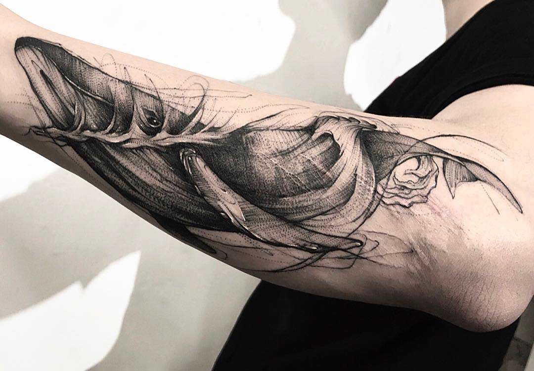 whale tattoo on arm