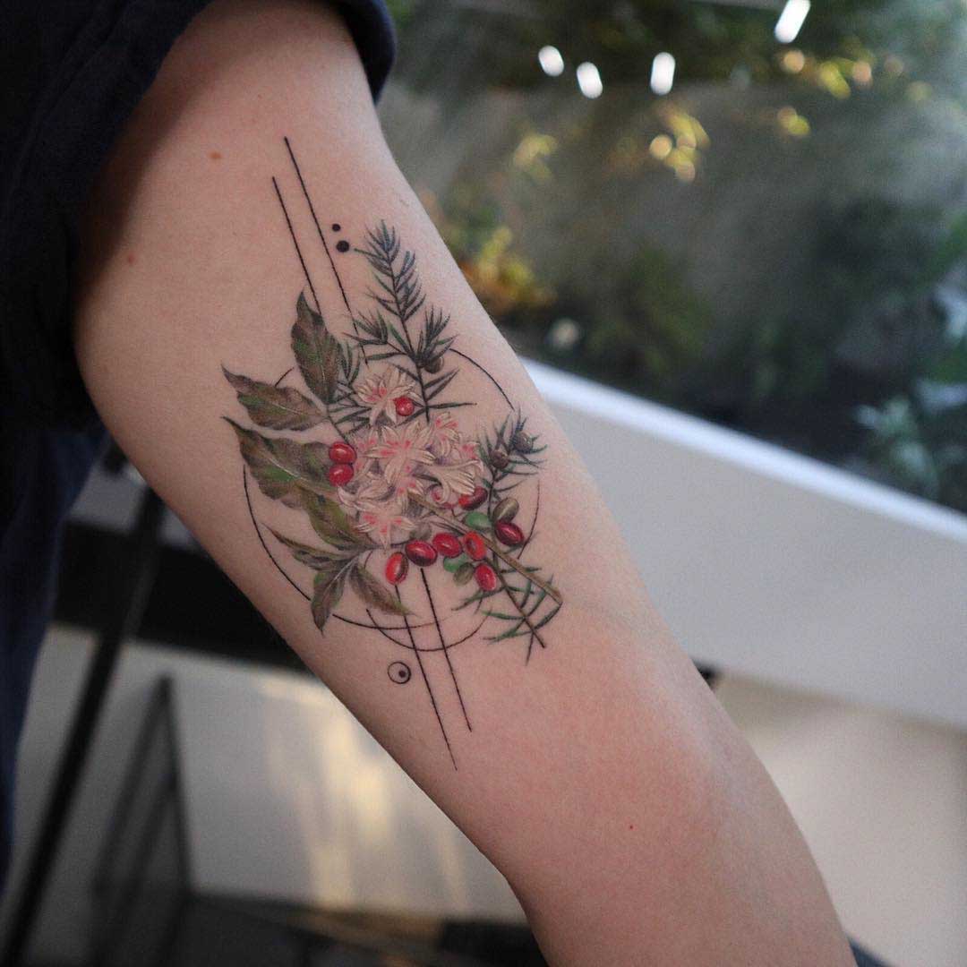 arm tattoo berries