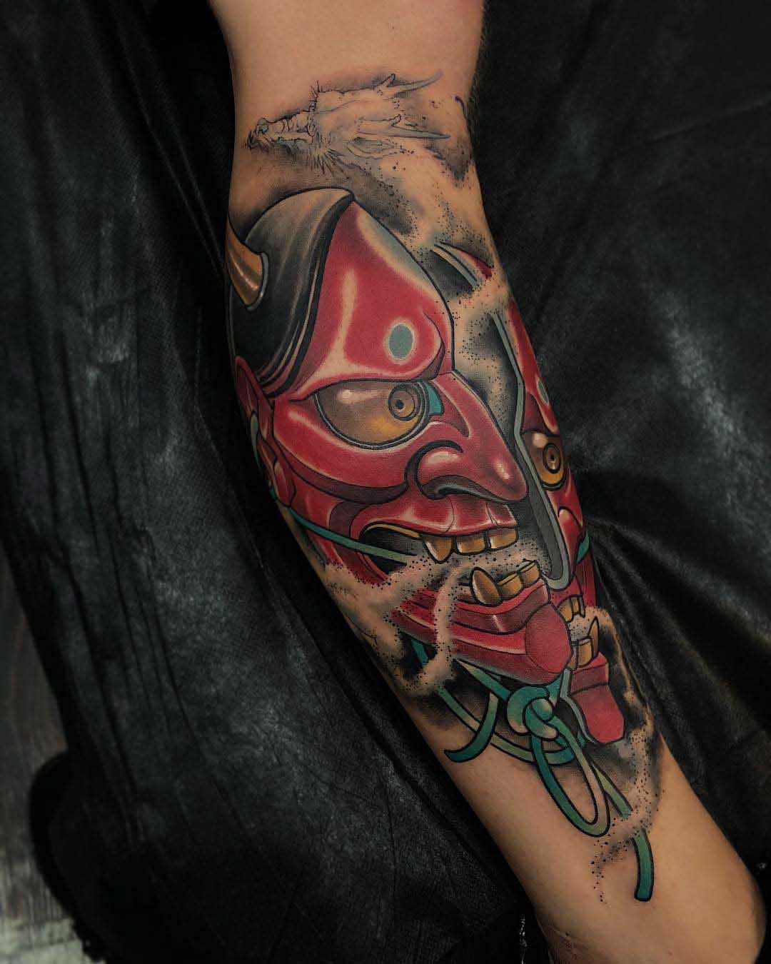 hannya mask tattoo on arm