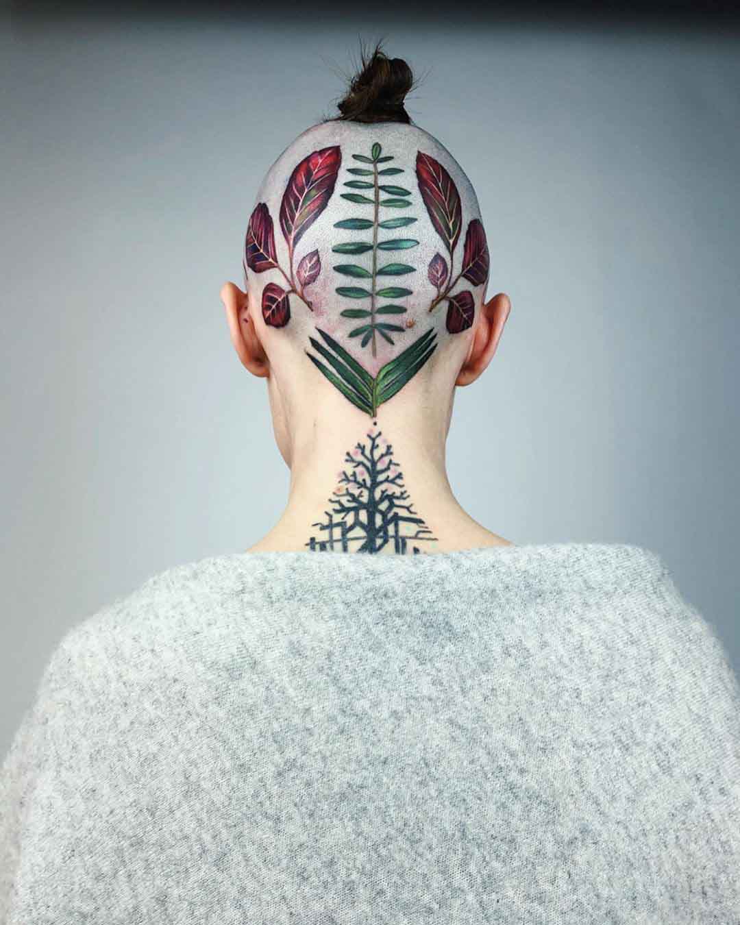 head tattoo of leaves